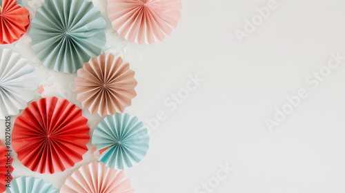 pastel paper fans decoration on white background