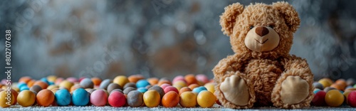 Horizontal banner, International Children's Day, teddy bear, many colored candies on light background, children's treat, copy space, free space for text, default image, 4k wallpaper, event background  © Da