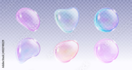 Color soap bubbles set isolated on transparent background. Vector realistic illustration of shampoo and water balls with light reflection on iridescent surface, laundry or bathroom design elements photo