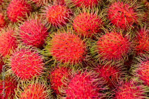 Pile of rambutan fruits on fresh market