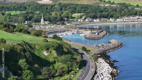 Glenarm on The Antrim Coast Road in Northern Ireland. Part of the Causeway Coastal Route. Aerial 50fps UHD photo