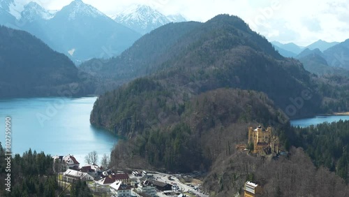 Scenic view of Hohenschwangau Castle, Alpsee lake and mountains in Germany photo