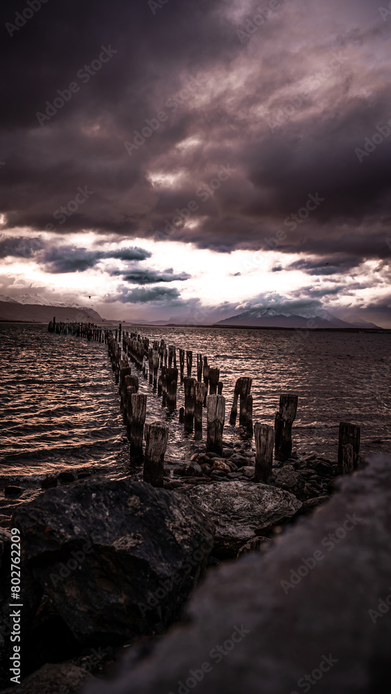 Fototapeta premium Sunset at Braun and Blanchard Dock in Puerto Natales, Patagonia, Chile, Magallanes Region