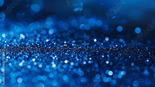 Abstract bright blue glitter with a bokeh background