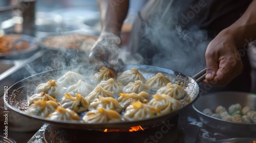A street food vendor skillfully preparing a batch of piping hot momos, filling the air with the irresistible scent of spices.