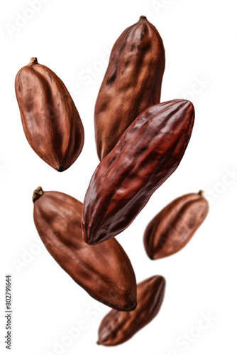 Levitation of cocoa beans isolated on a transparent background.