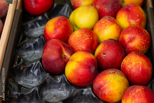 nectarines for sale at a fruit stand © funkenzauber