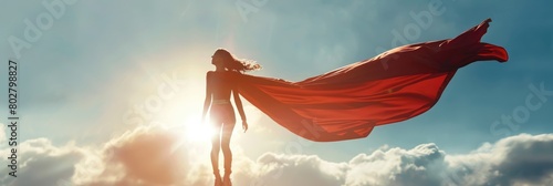 superhero woman flying in dramatic sky photo