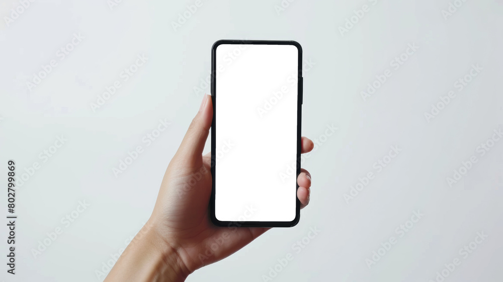 Close up of hand holding smartphone on white background