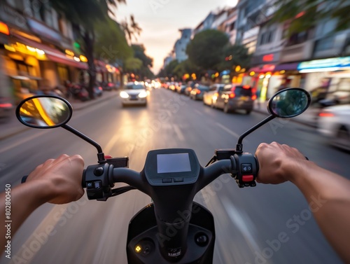 First-person view of a motorcycle ride at twilight, highlighting speed and urban commuting. © cherezoff