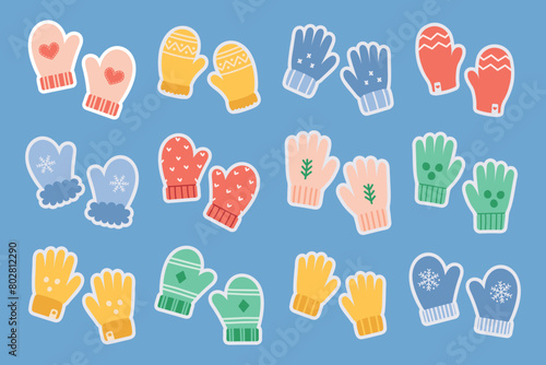 Knitted mittens and gloves set sticker, featuring a range of colors and patterns. Children and adults winter accessories. Cute cartoon vector illustration on soft blue background © Karelkart