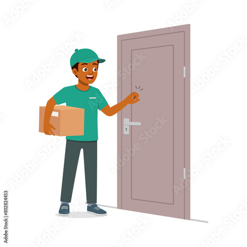 young delivery man holding package and knocking door