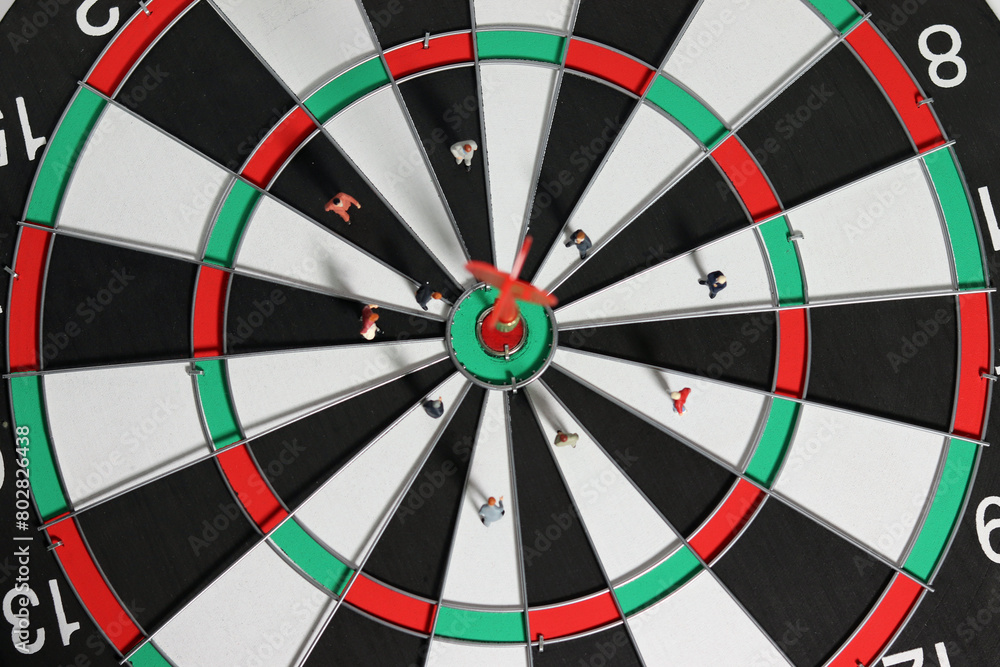 Business goals and concepts for achievement and victory. Miniature entrepreneurs meeting on dart boards where red dart arrows hit the centre.
Business goals and concepts for achievement and victory. Miniature entrepreneurs meeting on dart boards where red dart arrows hit the centre.