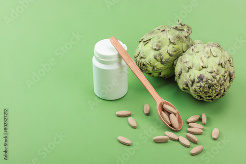 Dietary supplements Artichoke leaf extract capsules. Alternative medicine, herbal lifestyle photo