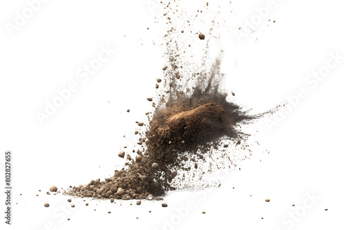 Soil particles in mid-air, depicting motion and texture against transparent background