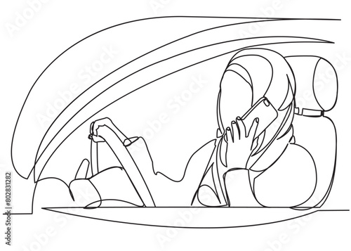 muslim woman driving a car