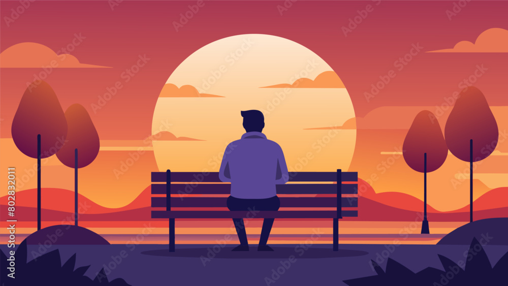 A solitary figure perched on a park bench their gaze fixated on the sunset as they reflect on the events of the day..