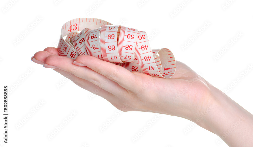 Centimeter measure tape in hand on white background isolation Centimeter measure tape in hand on white background isolation