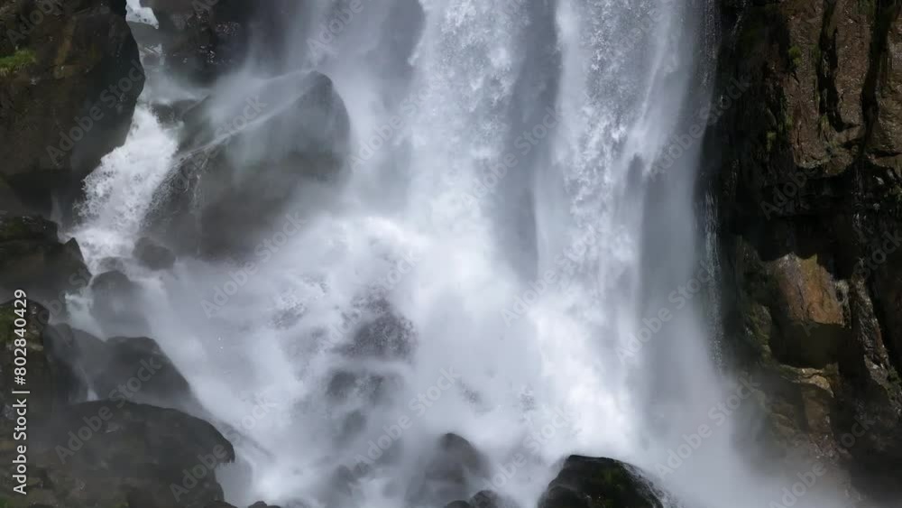 Close-up of Seerenbach Falls' powerful cascade, a hidden spectacle of nature in Walensee, Switzerland Close-up of Seerenbach Falls' powerful cascade, a hidden spectacle of nature in Walensee, Switzerland