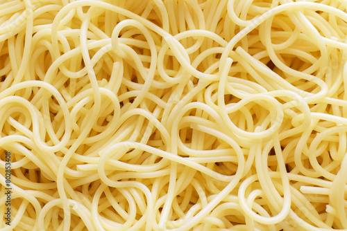 Cooked spaghetti pasta texture background. Food texture backdrop.