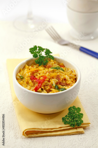 Scrambled eggs with rice and ham.