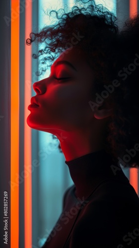 Serene Portrait with Vibrant Neon Lighting
