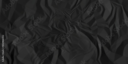 Black crumpled paper texture. Black wrinkled paper texture. Black paper texture. Black crumpled and top view textures can be used for background of text or any contents.