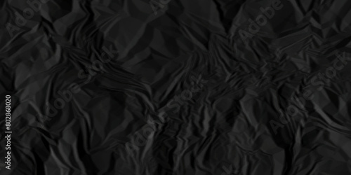 Black crumpled paper texture. Black wrinkled paper texture. Black paper texture. Black crumpled and top view textures can be used for background of text or any contents.