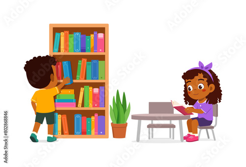 little kid read book in the library with friend