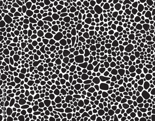 Seamless pattern of black pebbles arranged in a random organic pattern on a white background