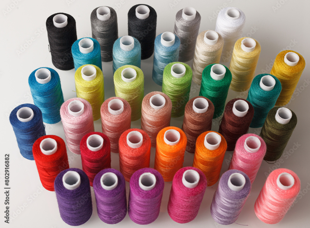 Set of colorful spools of thread Set of colorful spools of thread