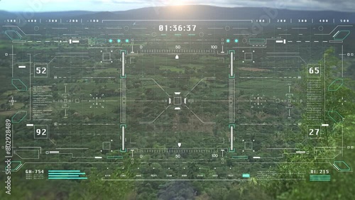 HUD digital panel interface aerial view flying through explore forest on sun shine behind the mountain landscape or perspective view with automatic tracking system 4K motion