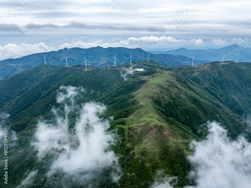 Aerial photography of mountain wind farm clouds and fog