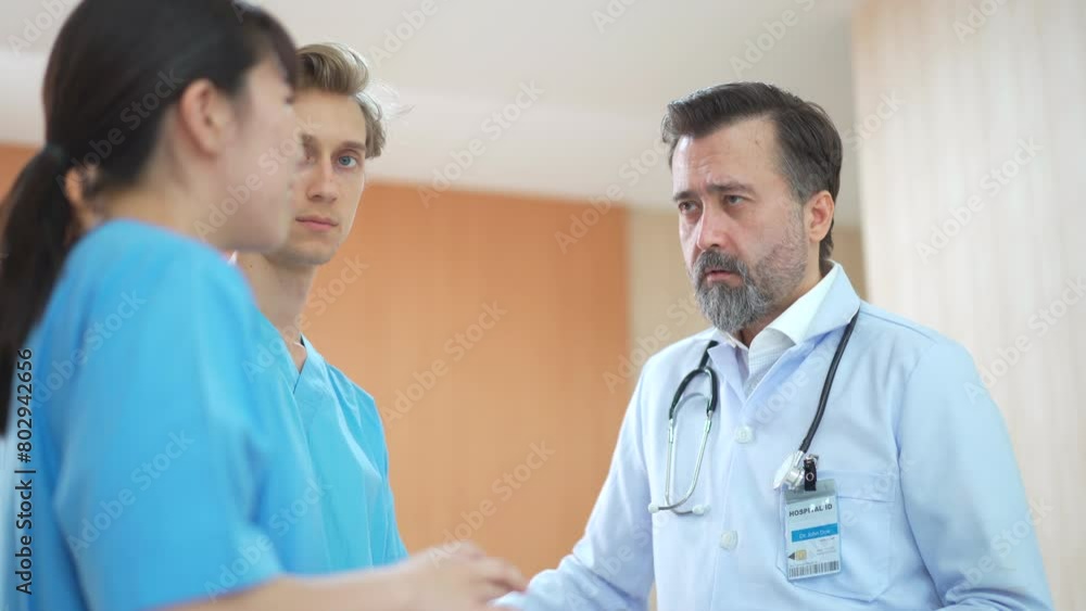 Team of medical staffs are discuss together in the hospital. Team of medical staffs are discuss together in the hospital.