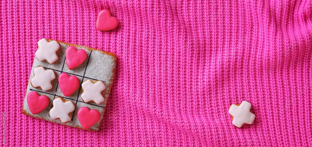 Cute Little Red Heart Pink Background. Warm Knitted Sweater Fabric. Square Banner. Top View. Valentine design Cute Little Red Heart Pink Background. Warm Knitted Sweater Fabric. Square Banner. Top View. Valentine design