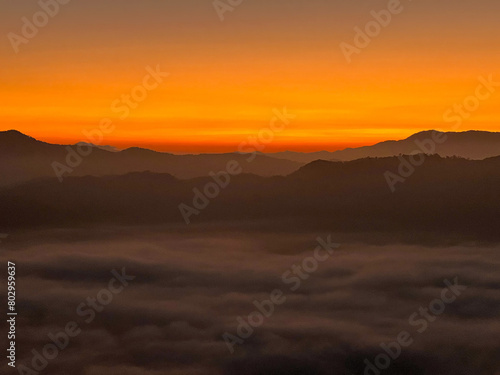 Enchanting Sunrise and Sea of Mist Atop Gunung Silipat in Aiyoeweng  Betong  Thailand.