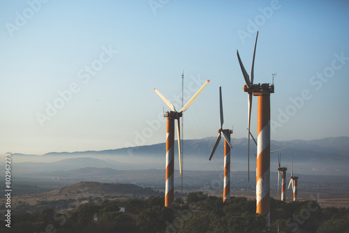 wind turbine at sunset photo