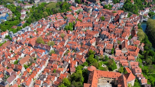 Aerial around the old town of Tübingen in Germany on a sunny Spring day.