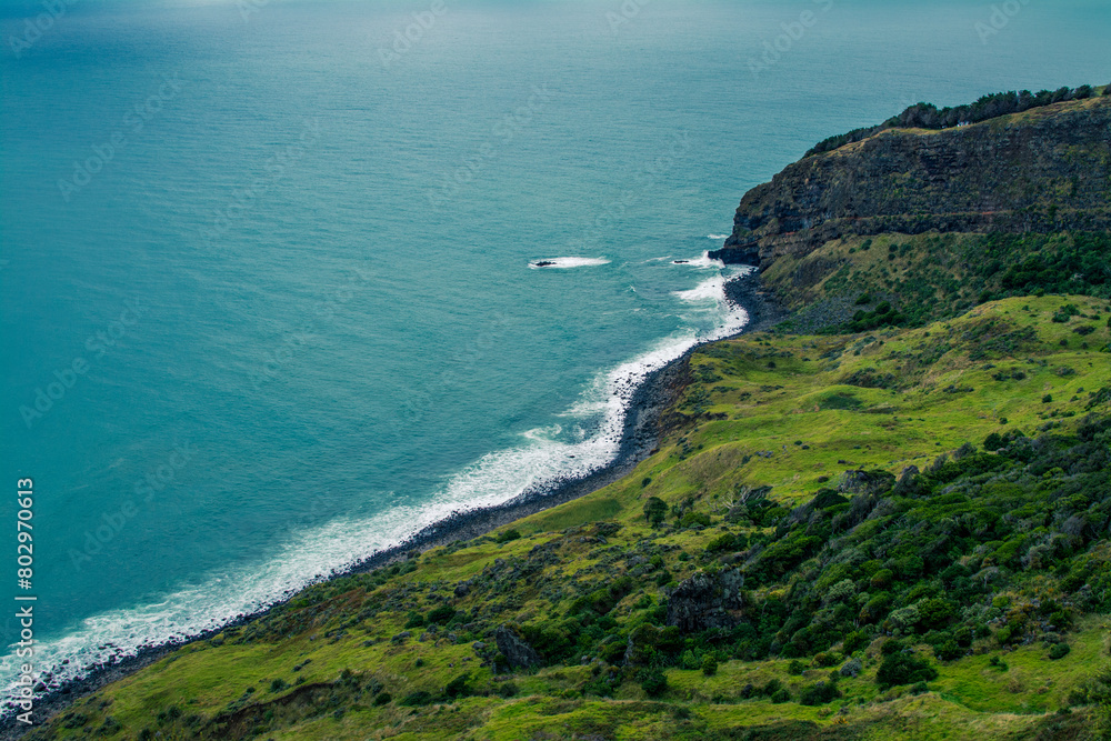 Panoramic view over Te Toto Gorge and Tasman Sea on an overcast summer day. High vantage point. Raglan, New Zealand Panoramic view over Te Toto Gorge and Tasman Sea on an overcast summer day. High vantage point. Raglan, New Zealand