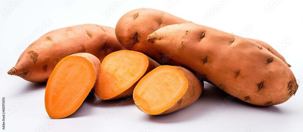 A copy space image of sweet potatoes on a white background A copy space image of sweet potatoes on a white background