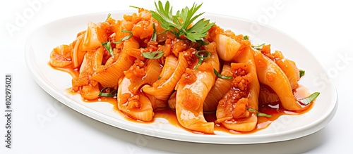 A close up image of squid kimchi on a clean white background with plenty of space for copy or text to be added. with copy space image. Place for adding text or design photo