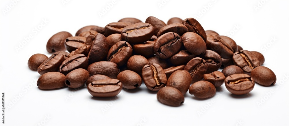 A close up image of coffee beans isolated on a white background with empty space for text. with copy space image. Place for adding text or design A close up image of coffee beans isolated on a white background with empty space for text. with copy space image. Place for adding text or design