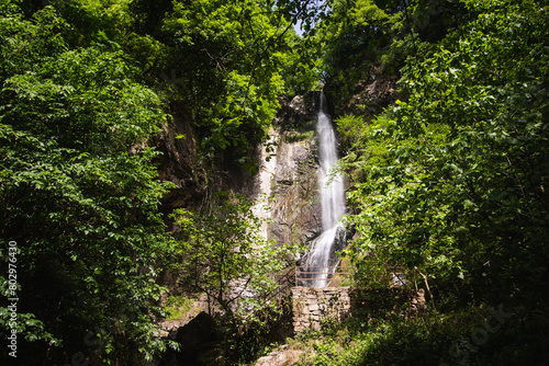 Large summer waterfall Makhuntseti in the town of Zeda Makhuntseti in Adjara, Georgia