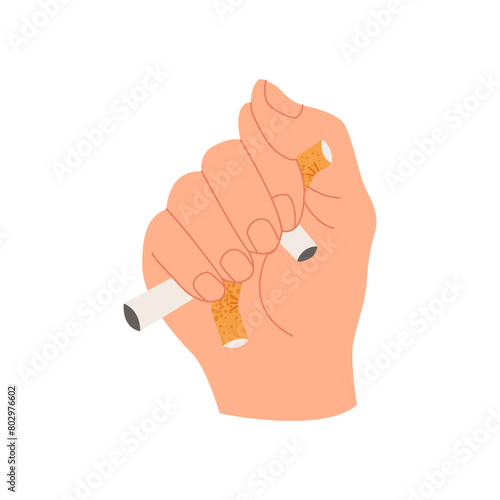 Hand squeezes cigarettes