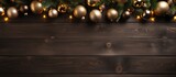 A festive Christmas scene with garland balls and an elegant black wooden table creates a captivating background with ample copy space for creative designs