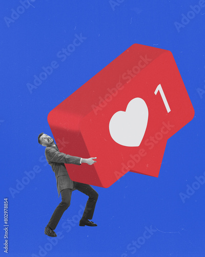 Businessman raising heavy social media like icon against blue background. Contemporary art collage. Pursuit of social media recognition. Concept of social media, modern technologies, Internet photo