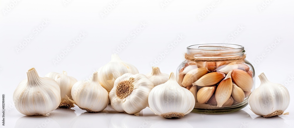 Fototapeta premium A copy space image of garlic preserved without moisture set against a plain white backdrop symbolizing its use in alternative medicine