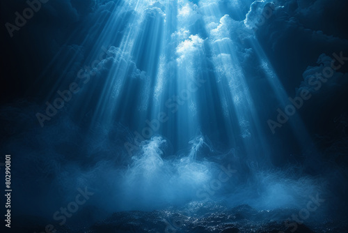 Blue sky with a lot of light shining through the clouds. Scene is peaceful and serene, as if the viewer is looking up at the sky and feeling a sense of calmness
