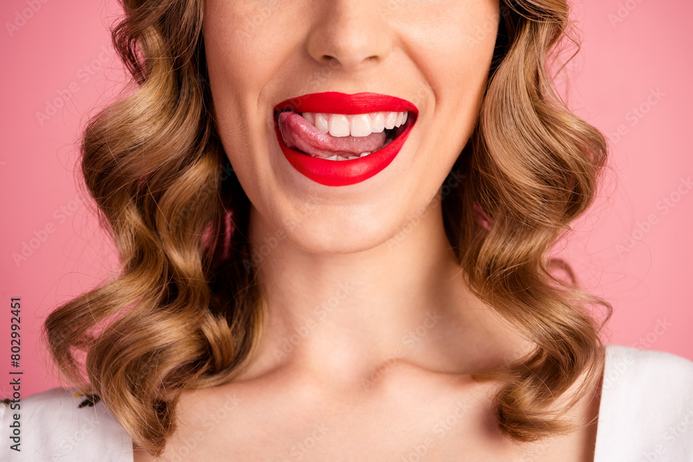 Cropped photo of lovely young woman lick teeth stomatology dressed stylish white garment hairdo isolated on pink color background Cropped photo of lovely young woman lick teeth stomatology dressed stylish white garment hairdo isolated on pink color background