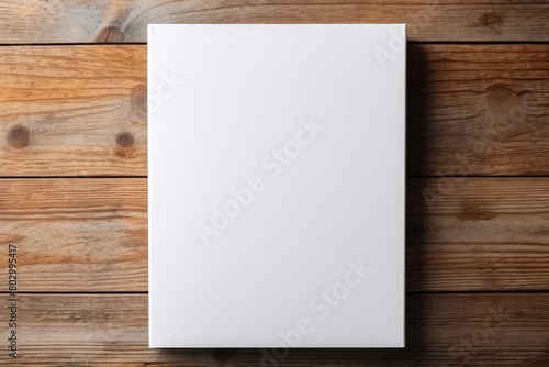 Blank White Book Standing on Wooden Surface with Selective Color Effect